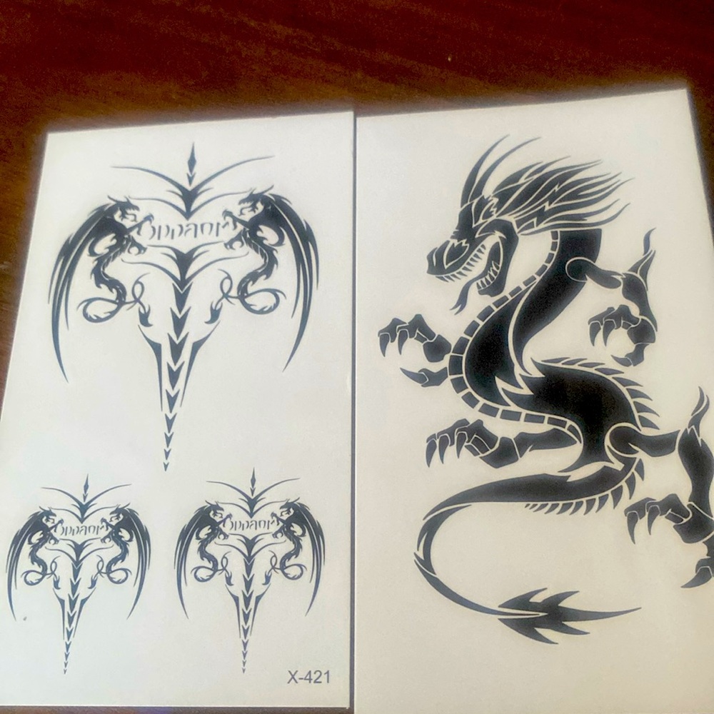 Two Medium Dragon Tattoos